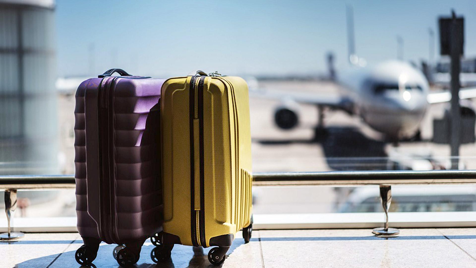 Two suitcases at an airport