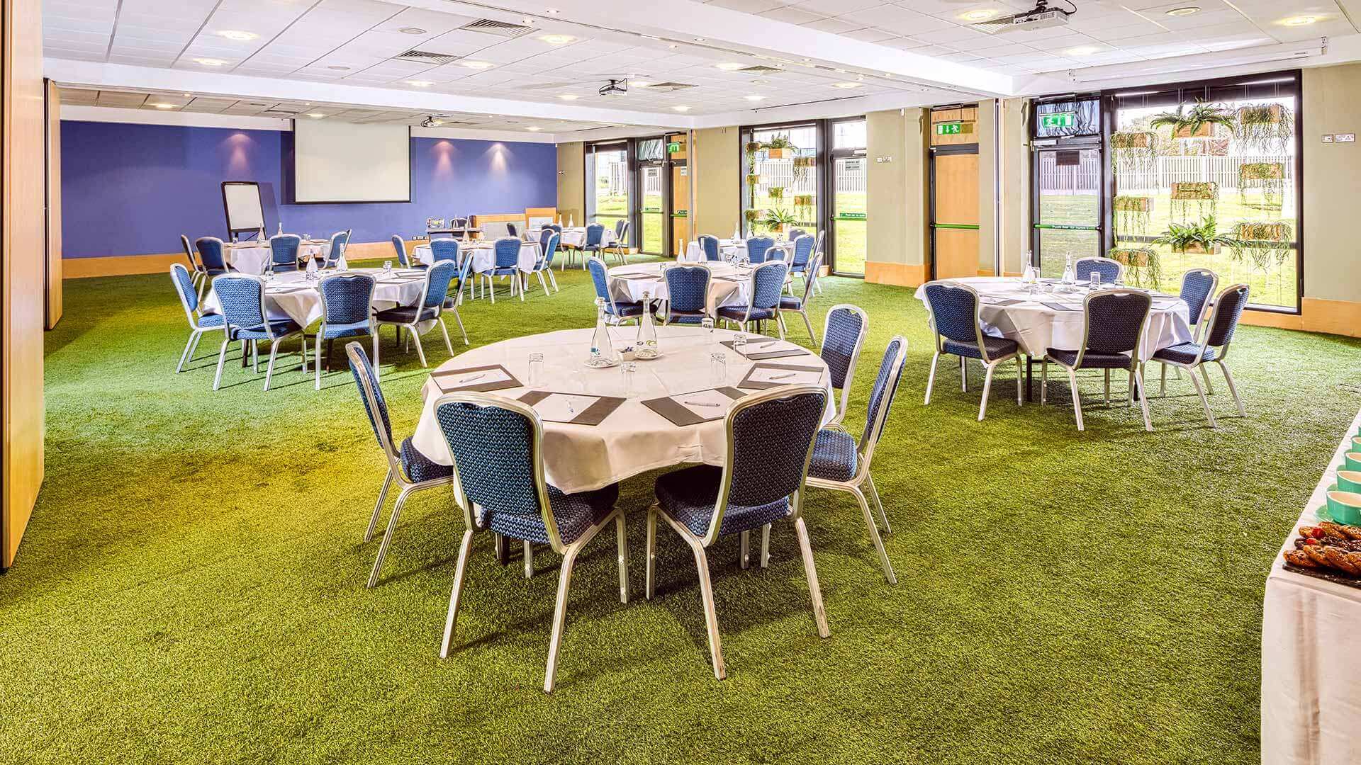 Conference venue in Cork with tables laid out cabaret style