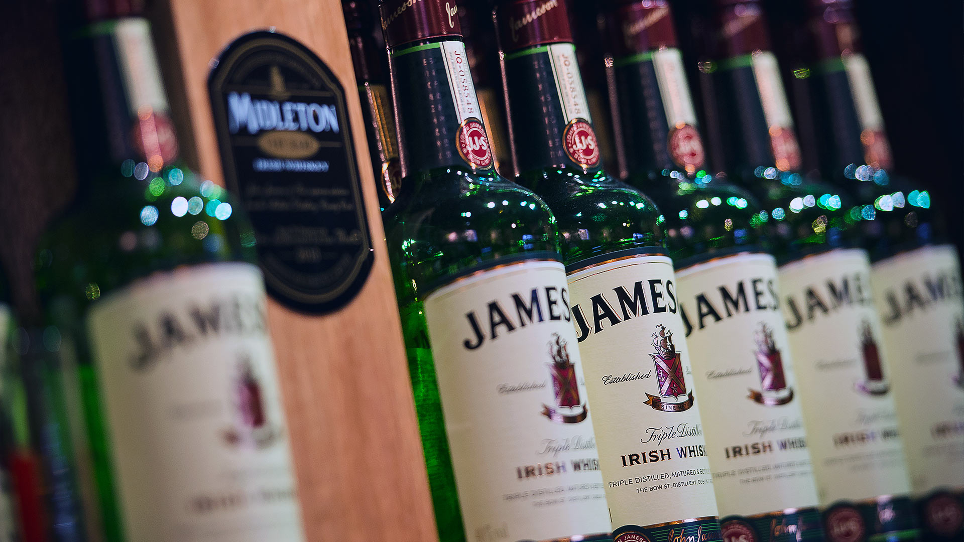 A line of Jameson Irish Whiskey bottles