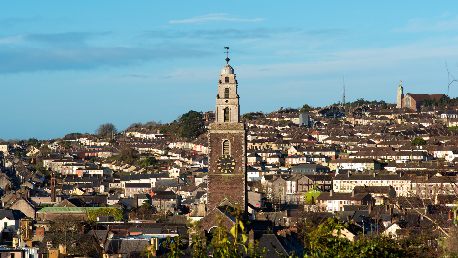 Shandon Bells tower and Cork City skyline in daytime